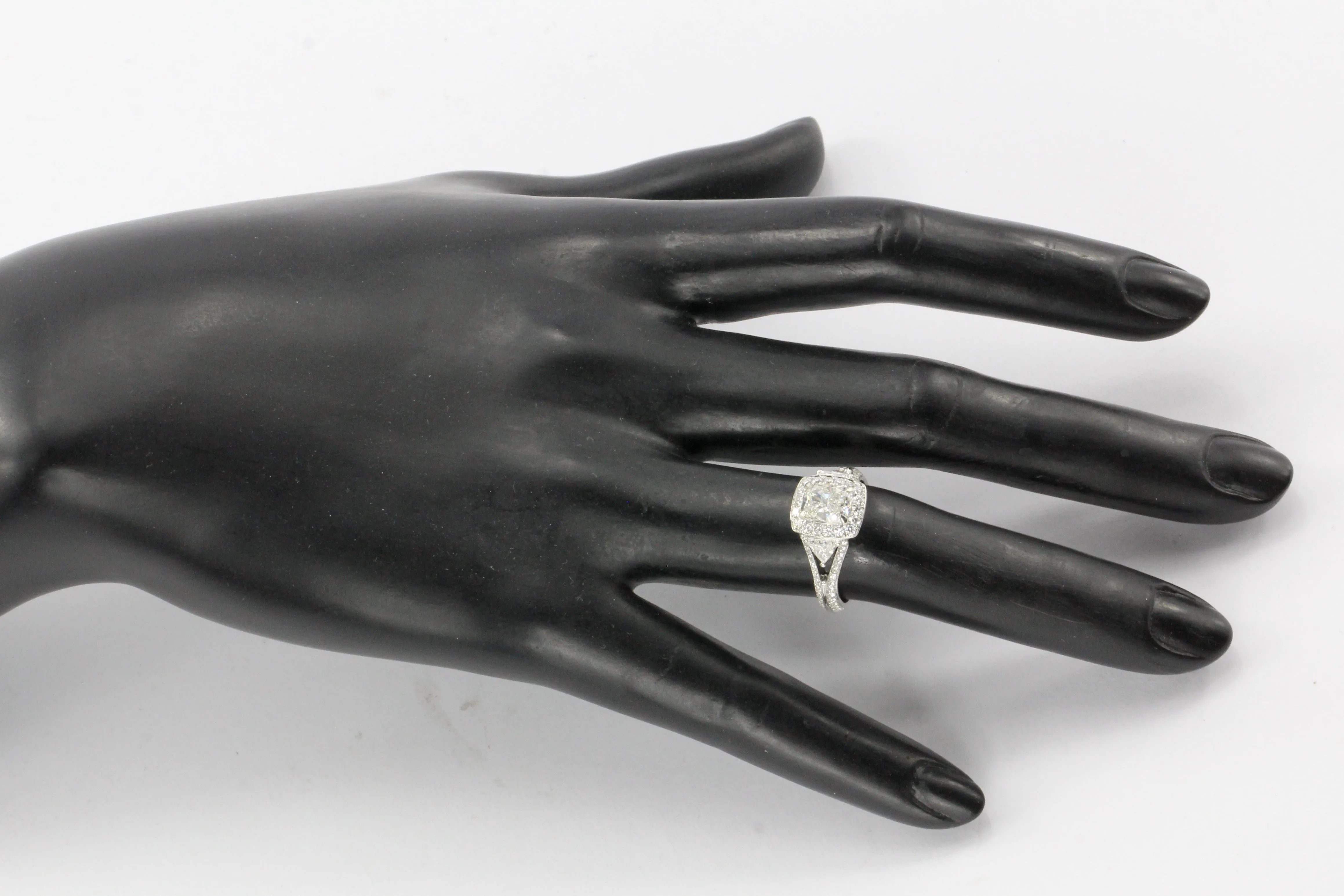 18K 1.5CT Cushion Cut Diamond Set With Two Trillion And Round Cut Diamonds