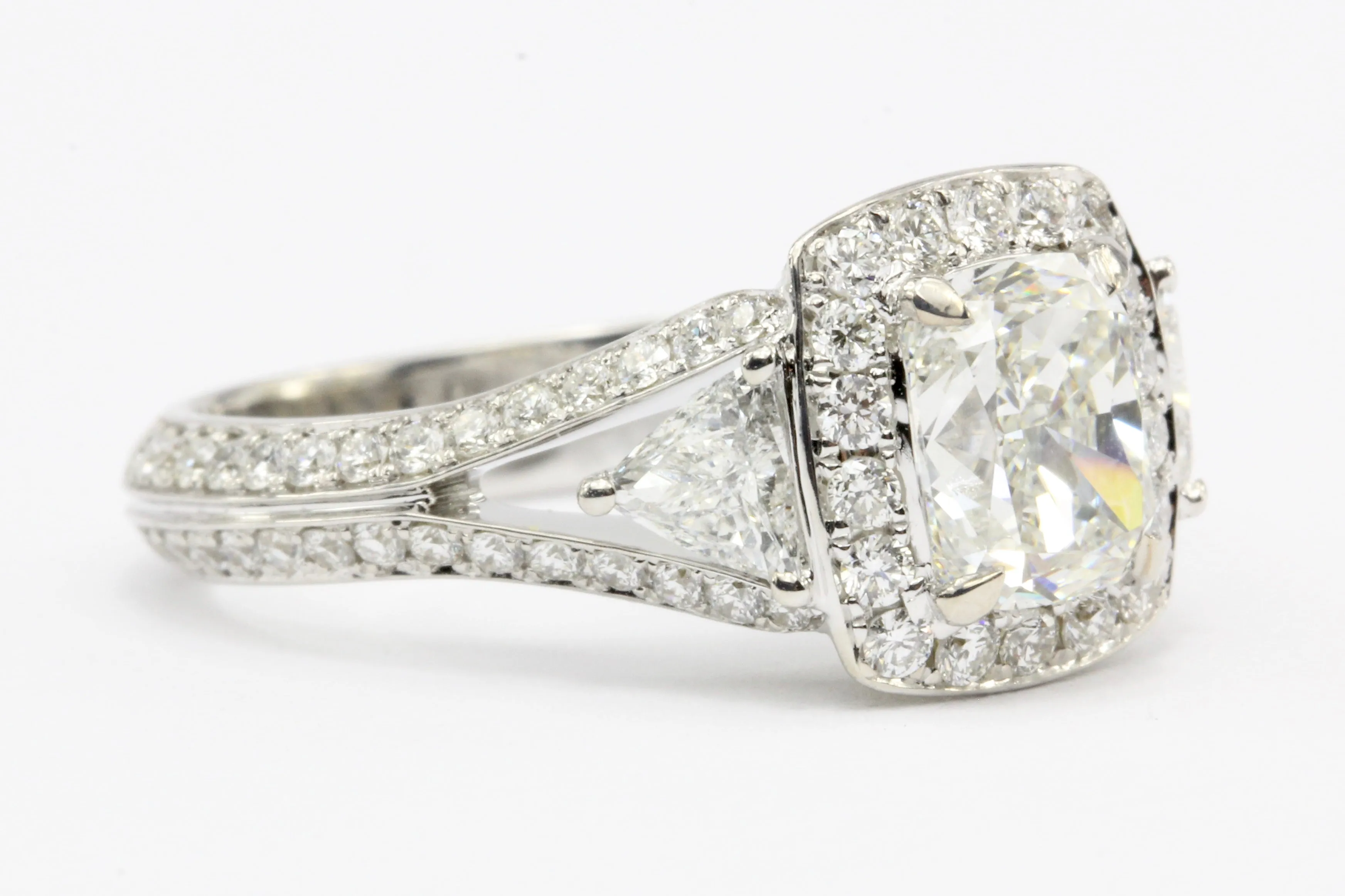 18K 1.5CT Cushion Cut Diamond Set With Two Trillion And Round Cut Diamonds