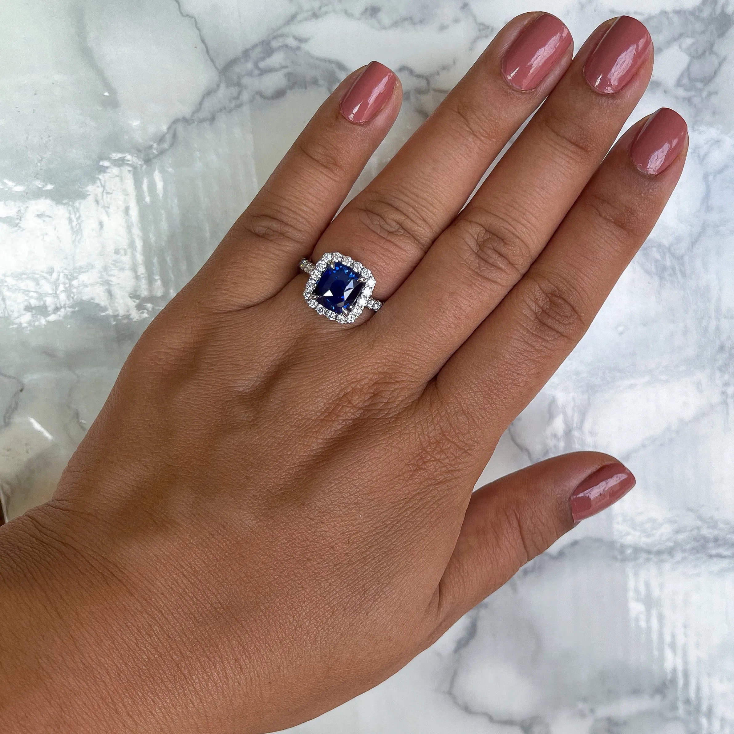 4.41ct. Cushion Blue Sapphire Ring with Diamond Halo in 18K White Gold