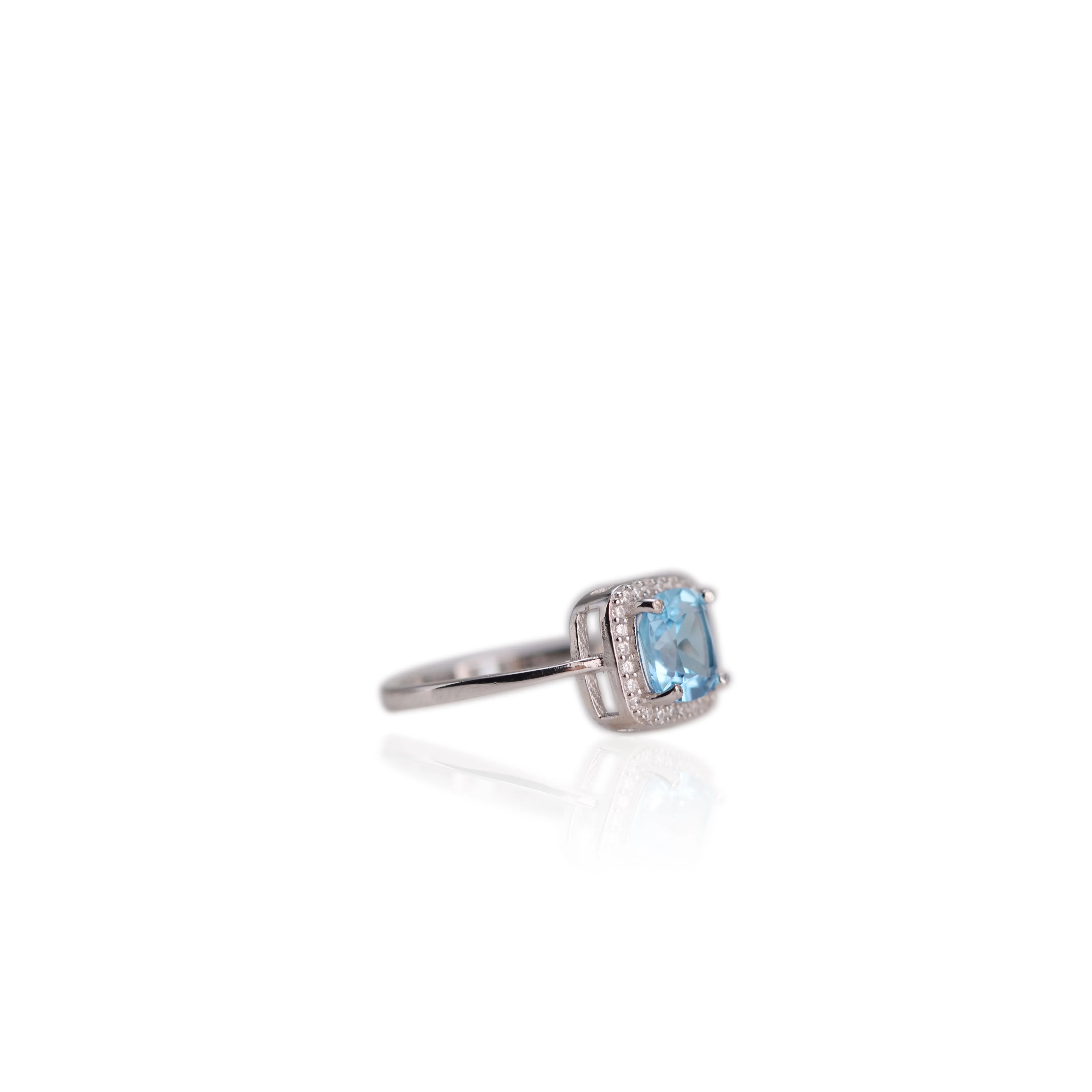 7 mm. Cushion Cut Swiss Blue Brazilian Topaz with Cz Halo Ring