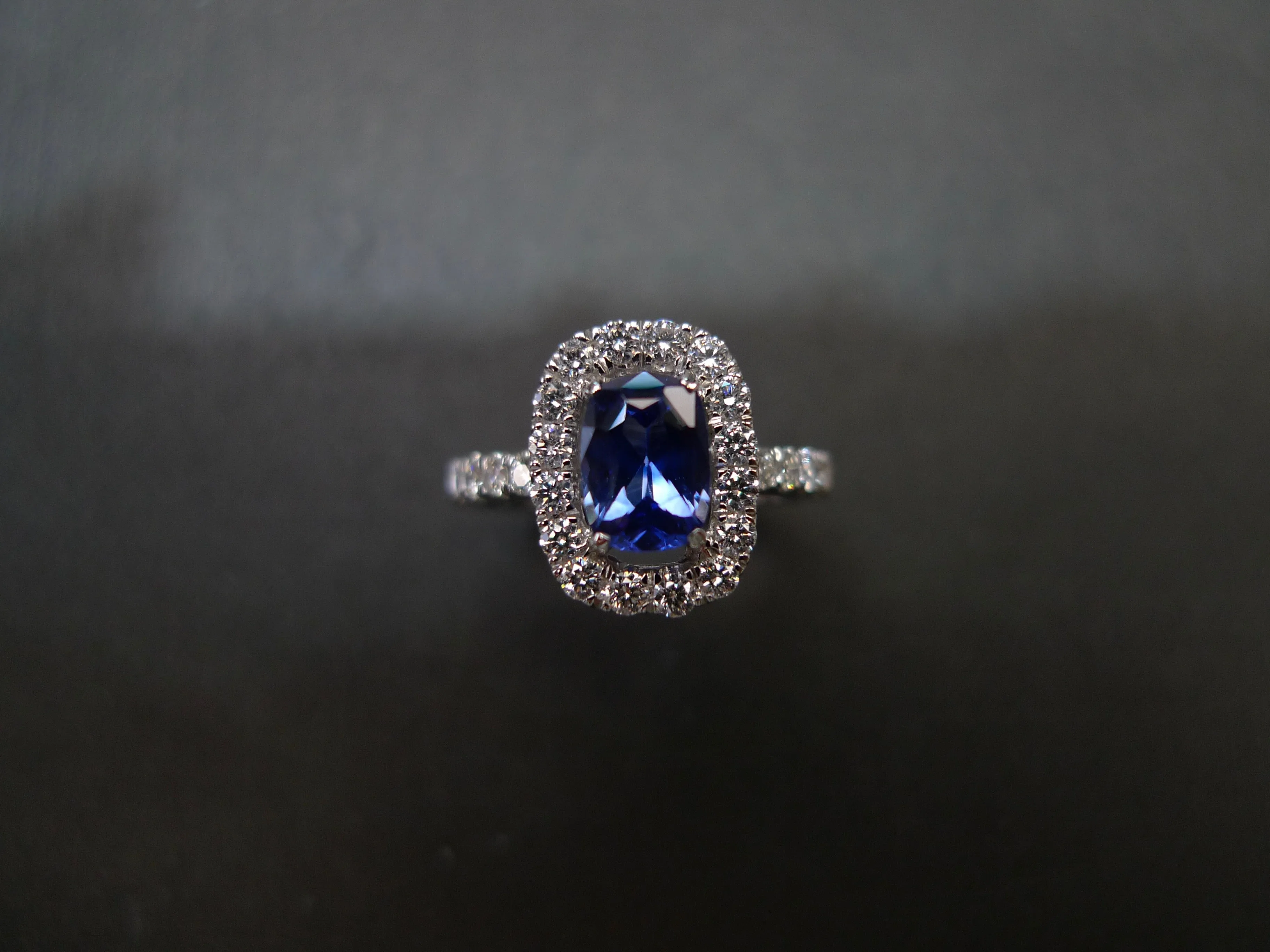 Blue Sapphire and Diamond Halo Ring