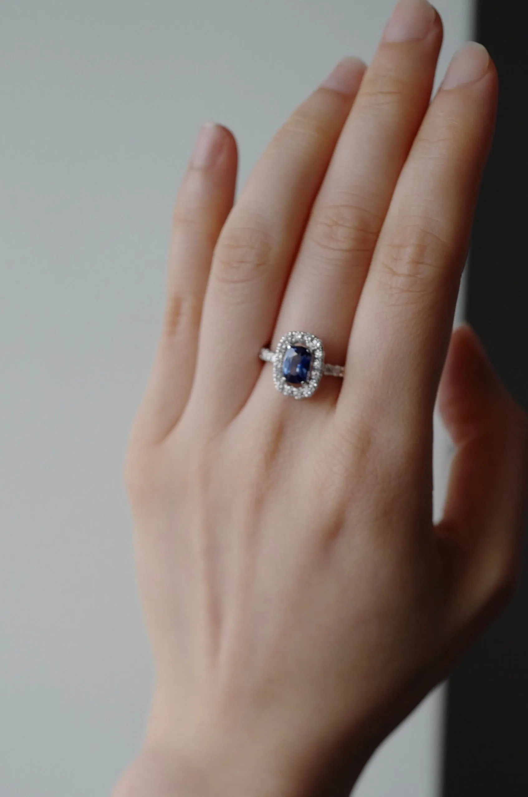 Blue Sapphire and Diamond Halo Ring