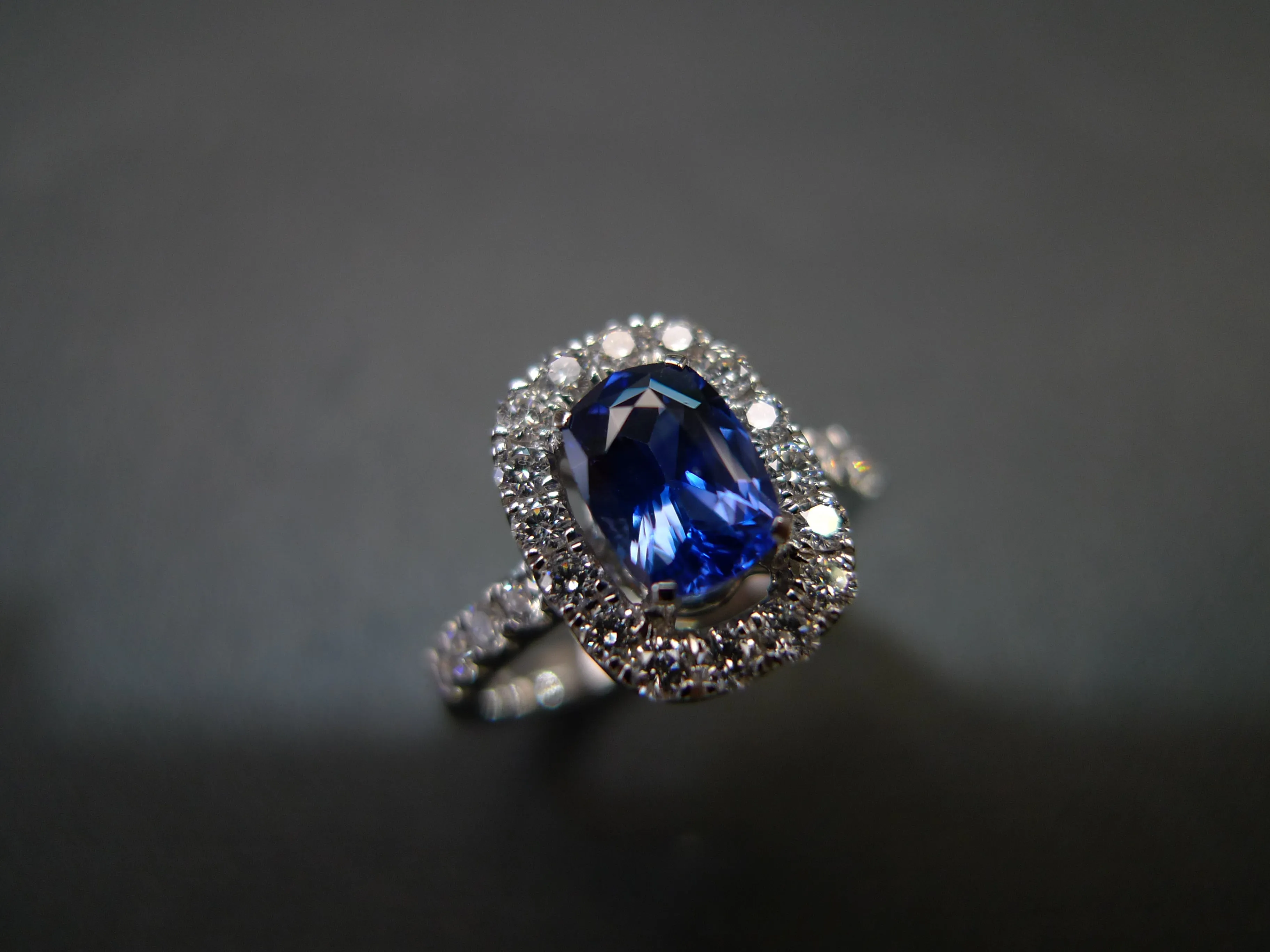 Blue Sapphire and Diamond Halo Ring
