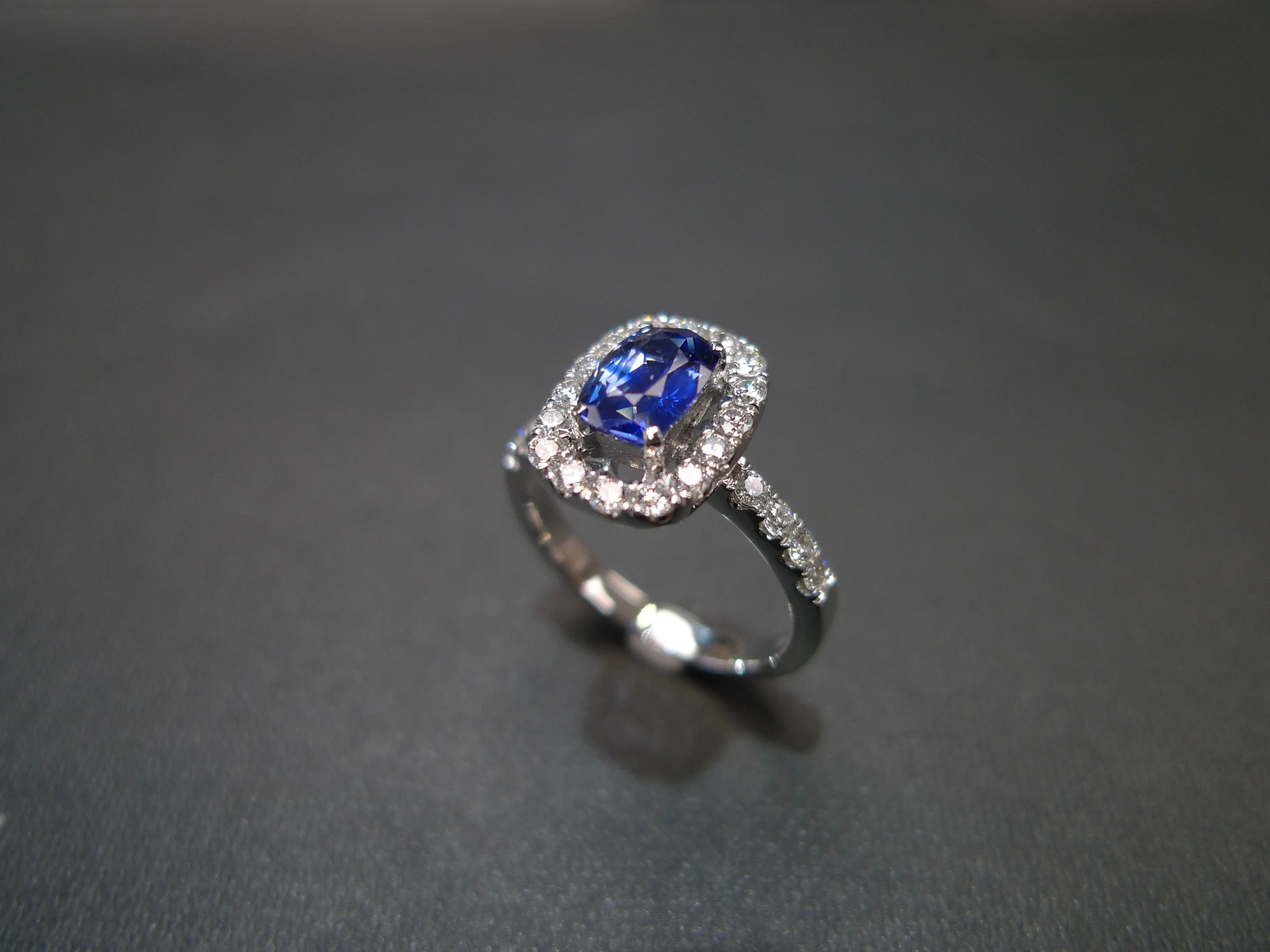Blue Sapphire and Diamond Halo Ring