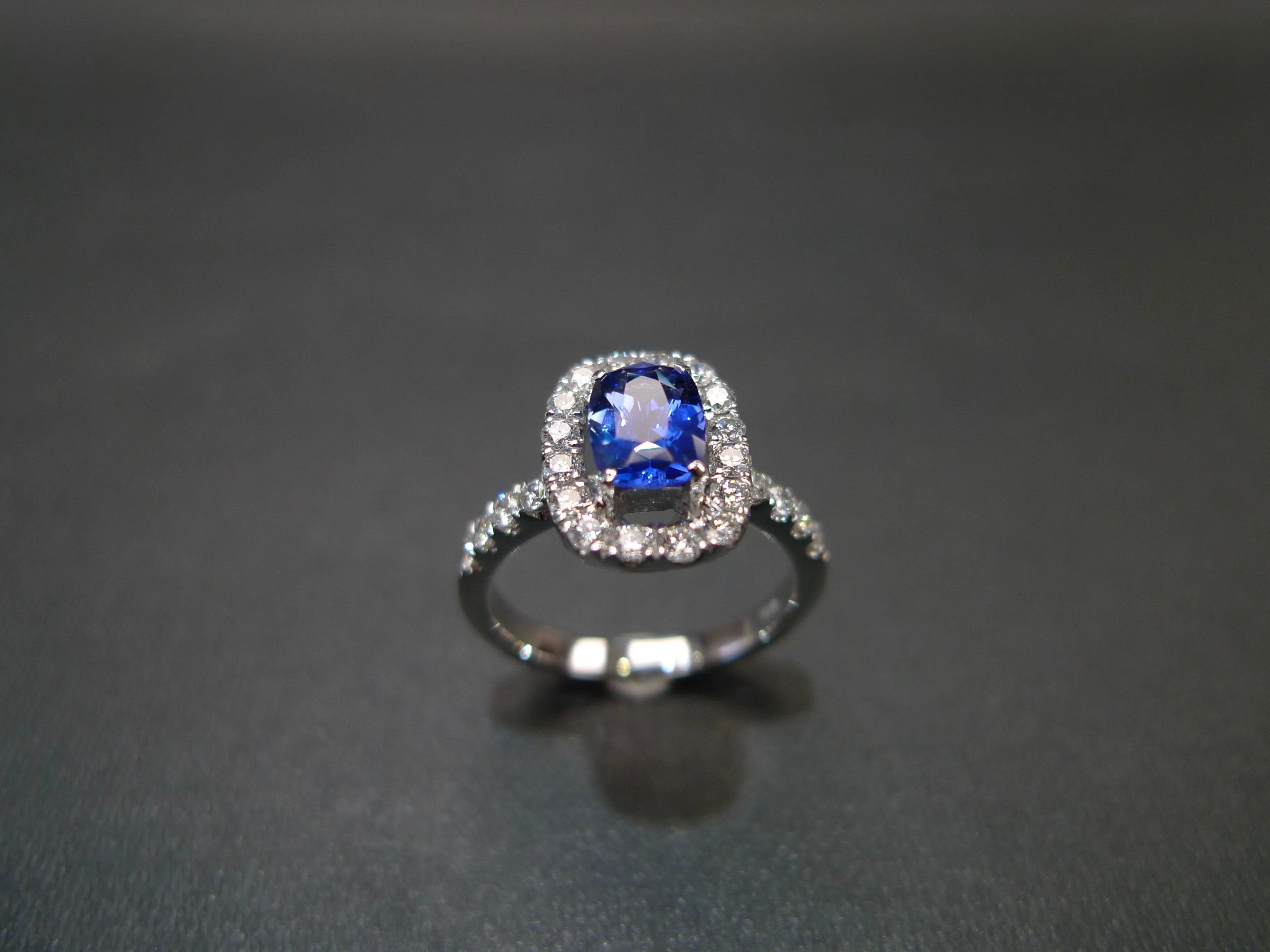 Blue Sapphire and Diamond Halo Ring
