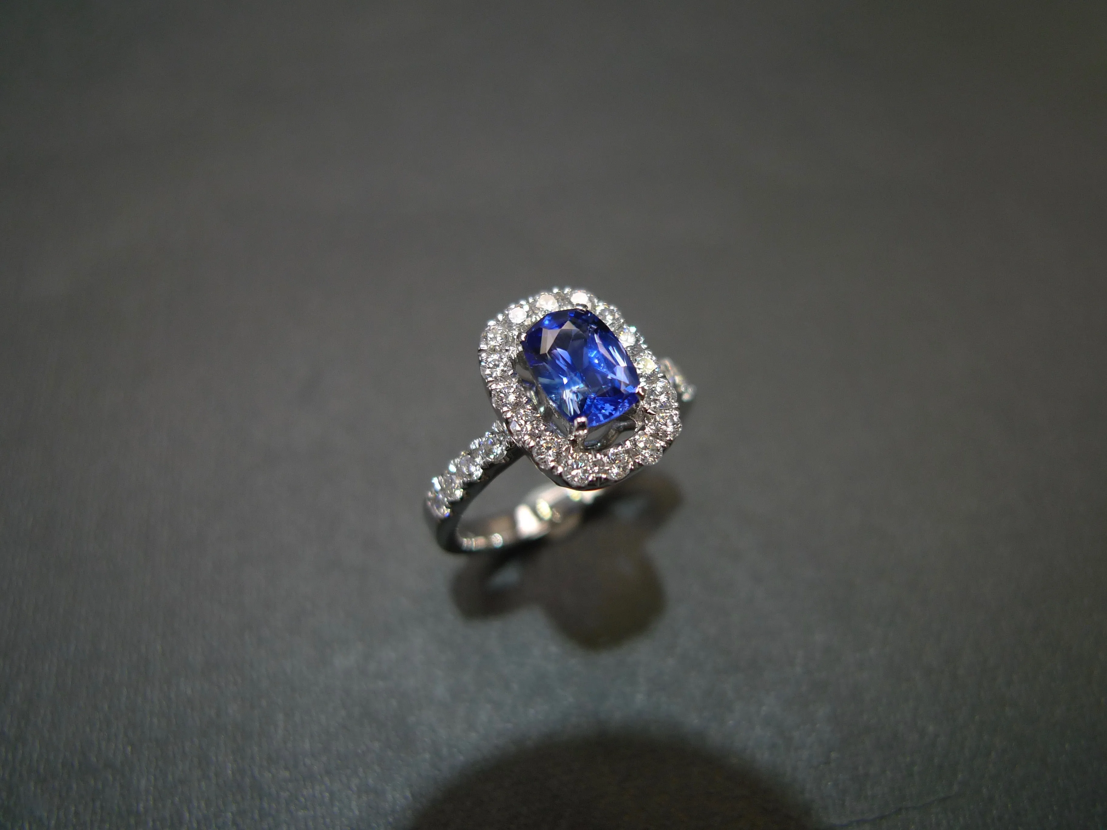 Blue Sapphire and Diamond Halo Ring