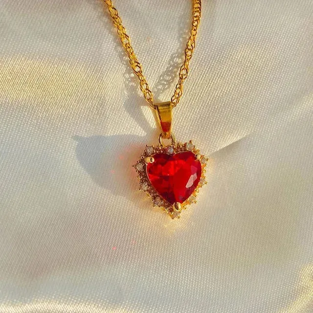 Collection of necklaces with heart-shaped gemstone pendants