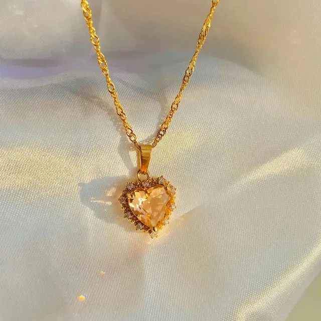 Collection of necklaces with heart-shaped gemstone pendants