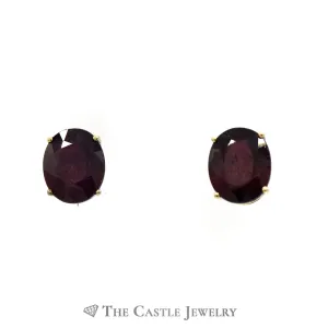 Oval Cut Ruby Stud Earrings in 4 Prong Mounting w/ Butterfly Backs Crafted in 14k Yellow Gold