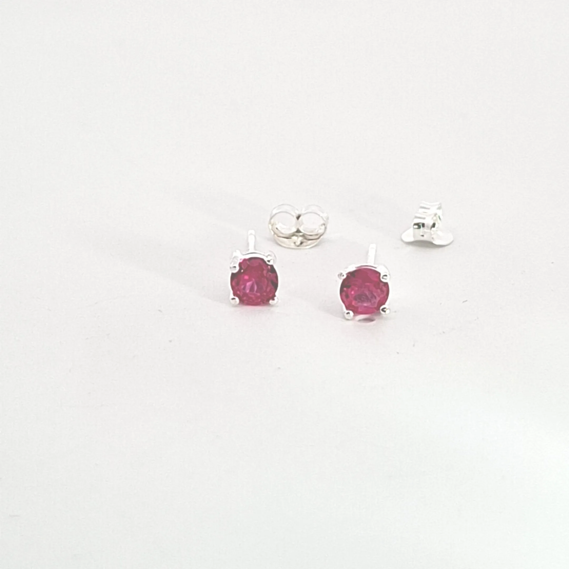 Sterling silver 4mm Ruby Red CZ claw set stud earrings 37893