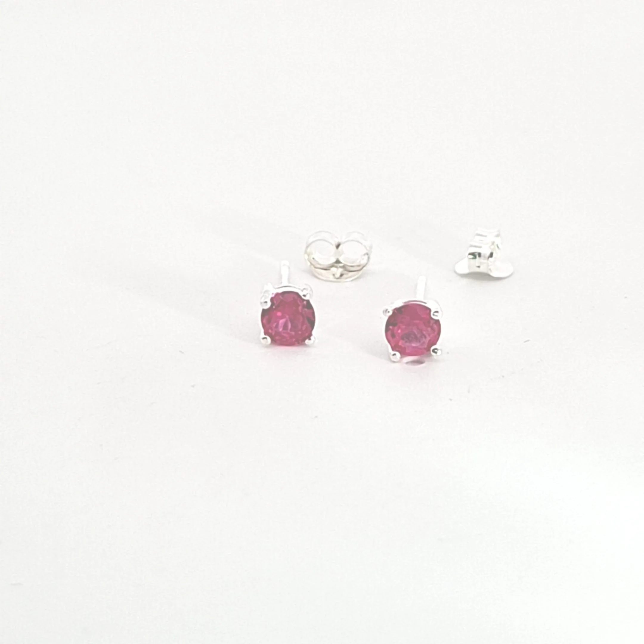 Sterling silver 4mm Ruby Red CZ claw set stud earrings 37893