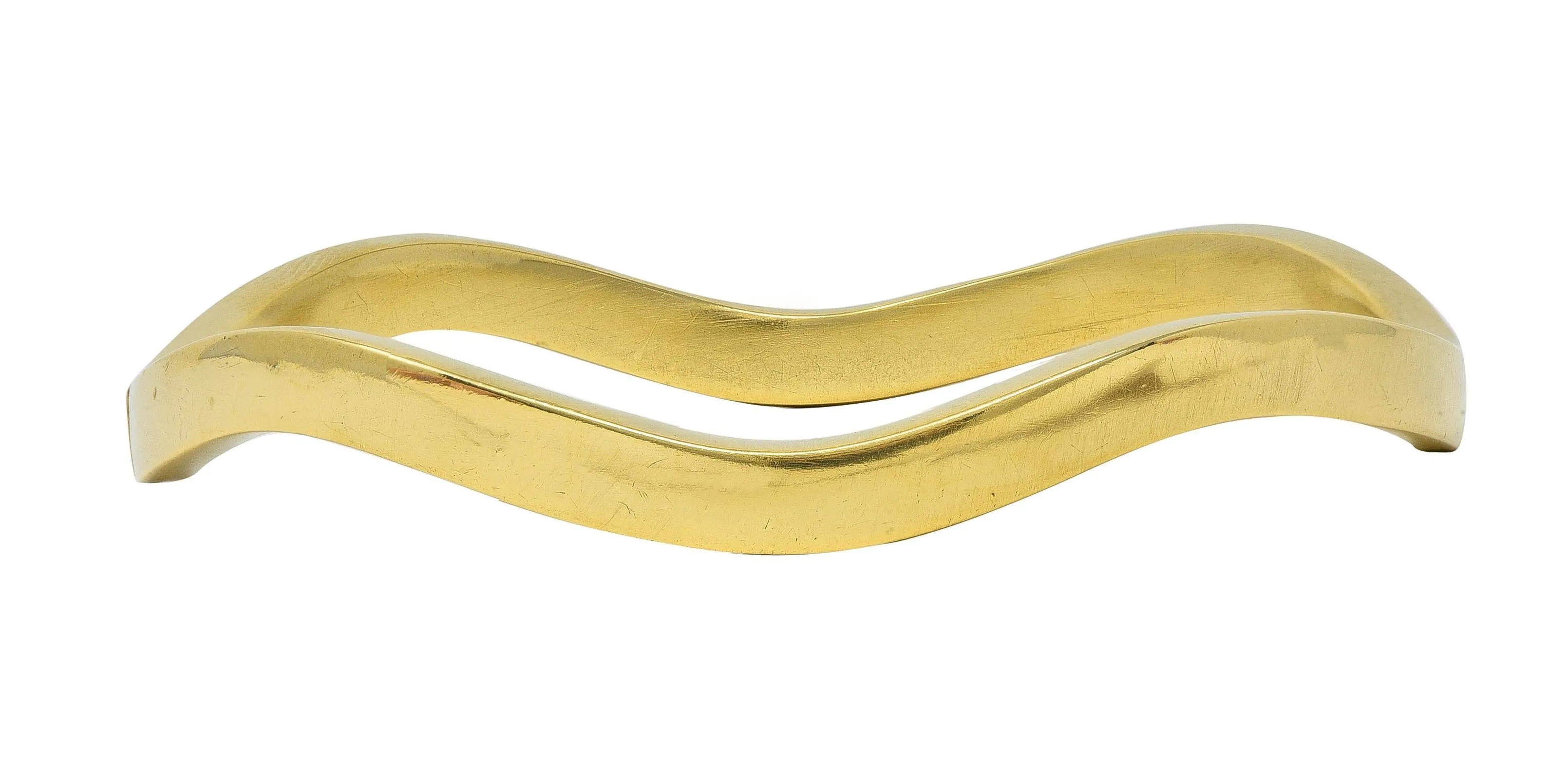 Tiffany & Co. 1980's 18 Karat Yellow Gold Vintage Inscribed Wave Bangle Bracelet