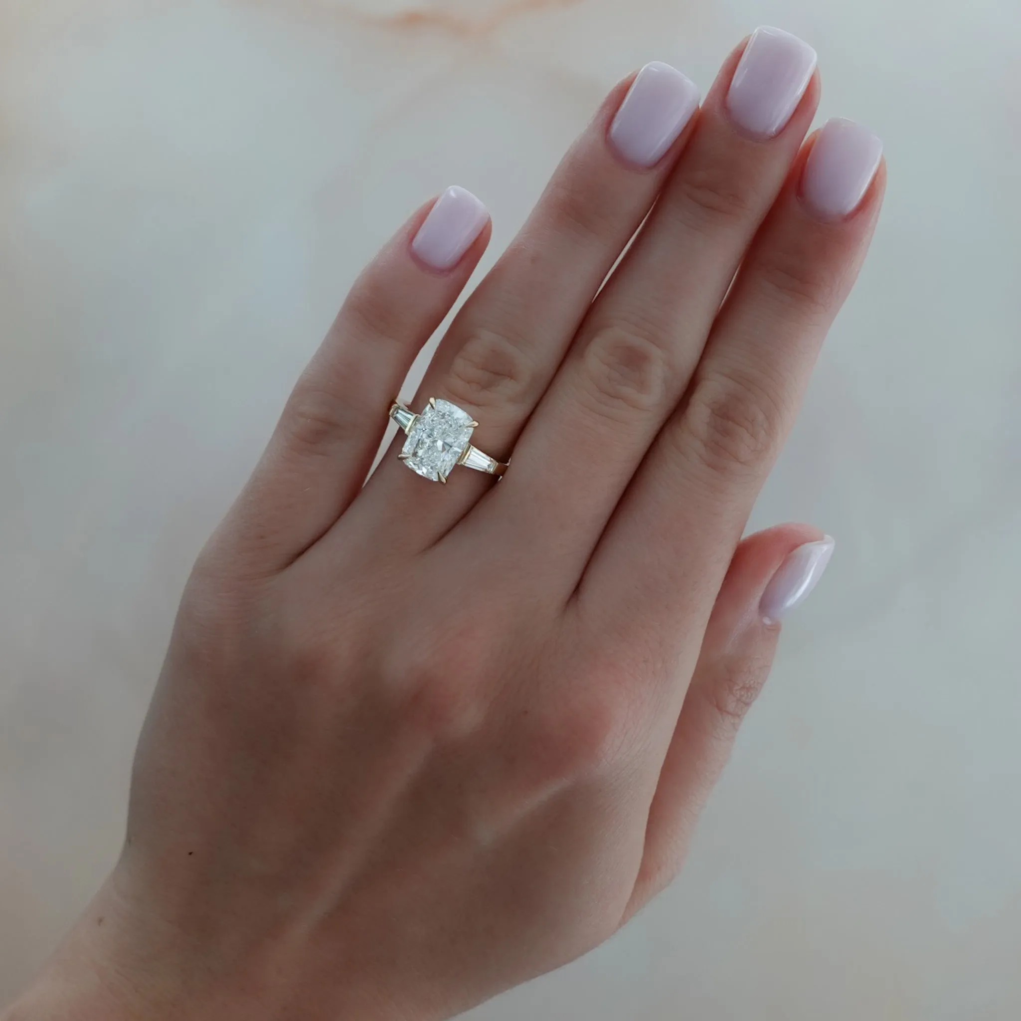 Translunar Tapered Baguette Engagement Ring With Elongated Cushion Cut Diamond
